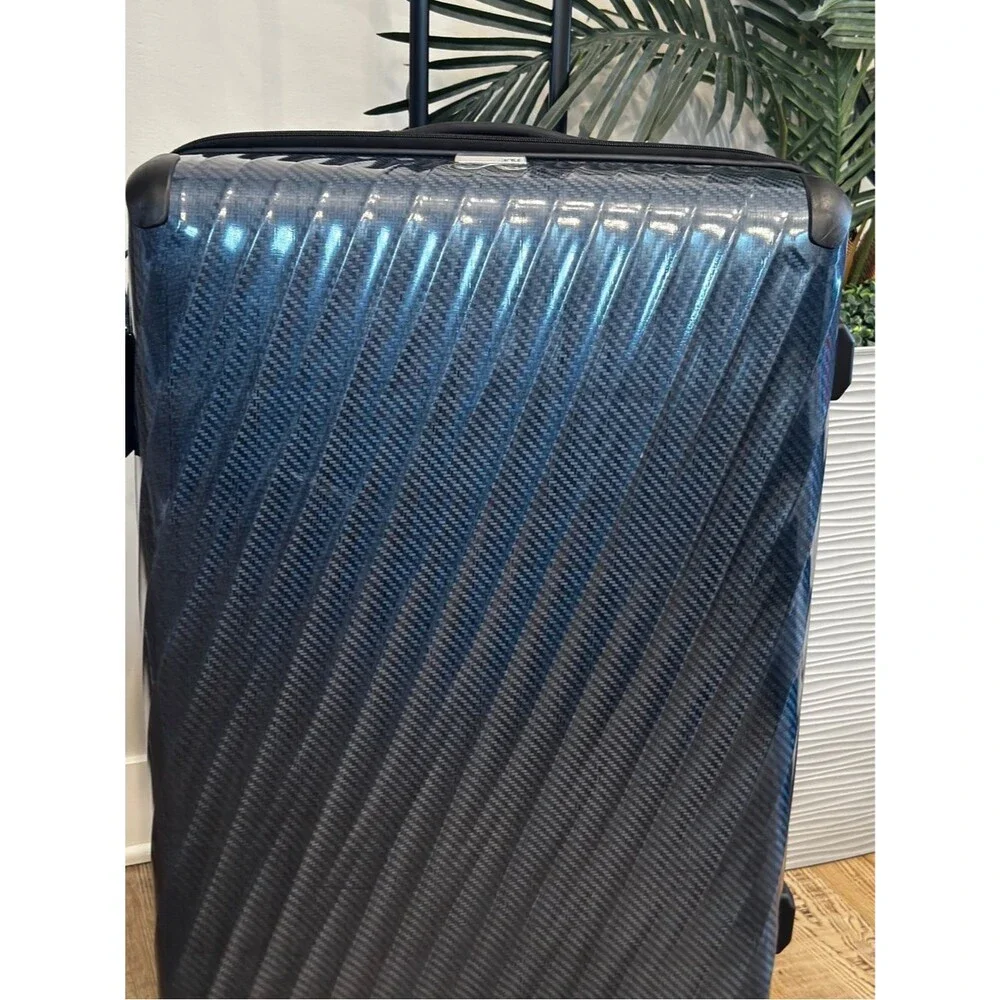 Tumi Large Expandable Checked Glossy Navy Hard-Shell Spinner Luggage suitcase